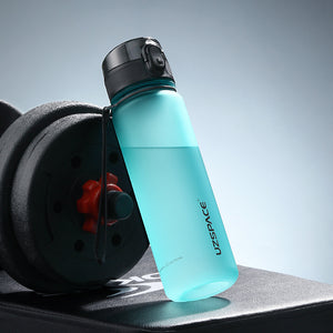 Leak-Proof Tritan Sports Water Bottle with Strap – BPA-Free, Stylish U-Shape Travel Bottle | 350ML–1000ML, Multiple Colors